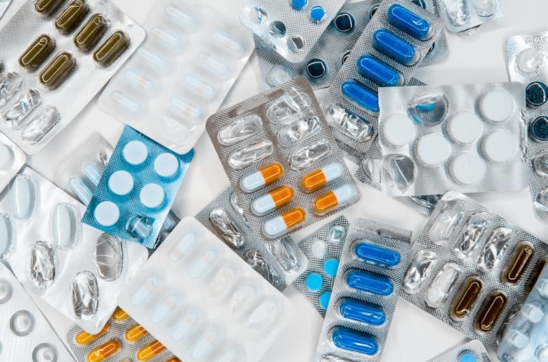 Pharmacist consulting about fish oil supplement safety and interactions